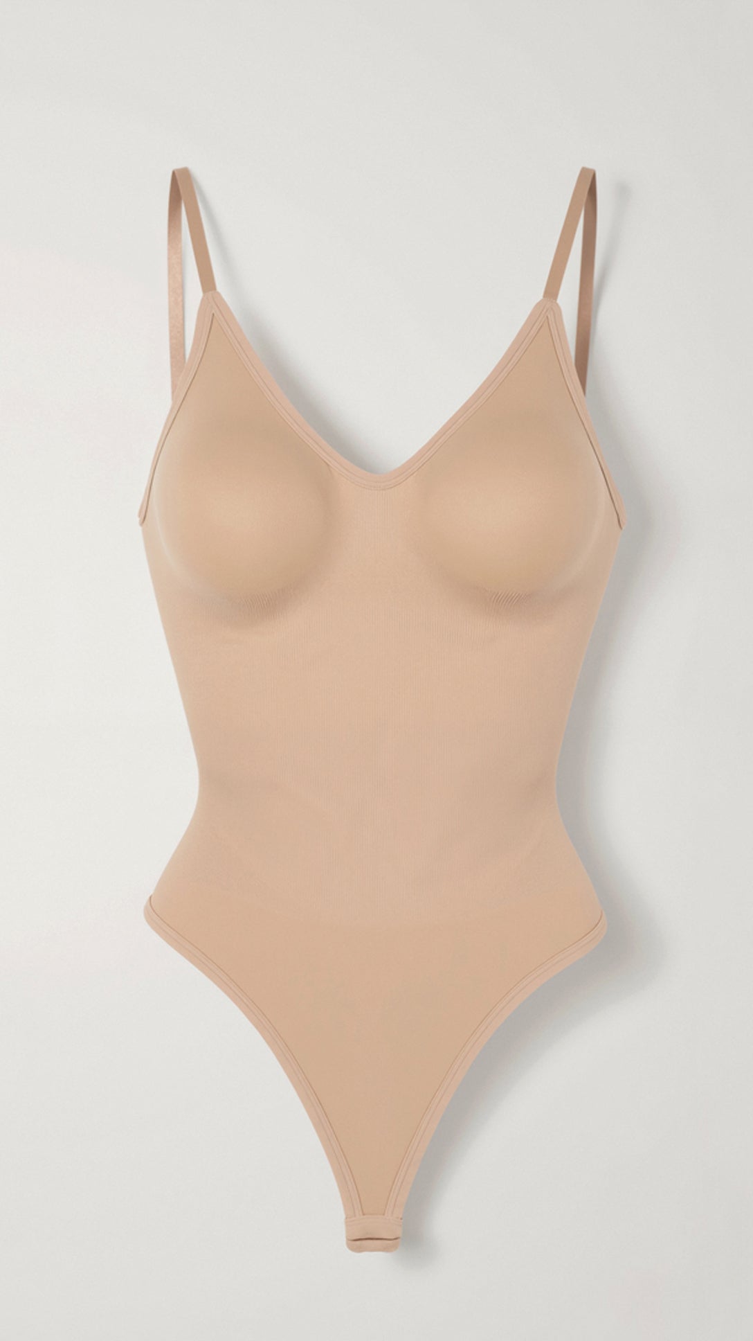 Seamless Low-Back Body Suit Perfectly Fitting the Body
